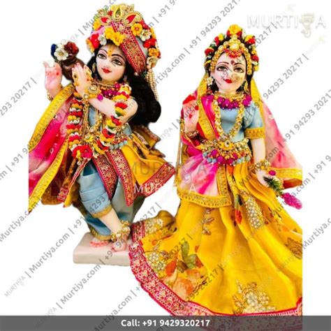 Iskcon White Radha Krishna Marble Statue With Yellow Blue Clothes