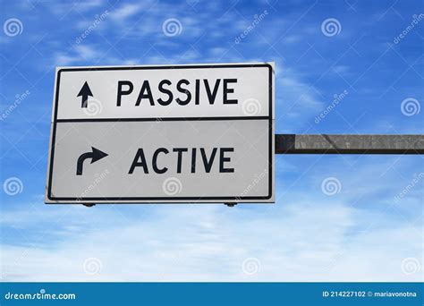 Road Sign With Words Passive And Active White Two Street Signs With Arrow On Metal Pole Stock