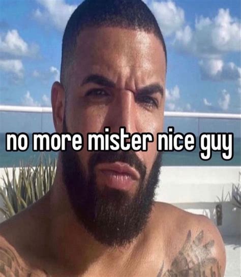 A Man With A Beard And No More Mister Nice Guy Written On His Chest Is