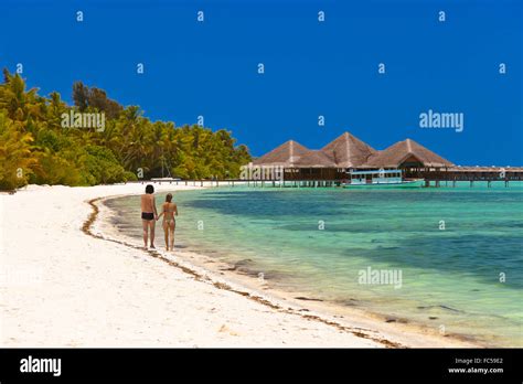 People on Maldives beach Stock Photo - Alamy