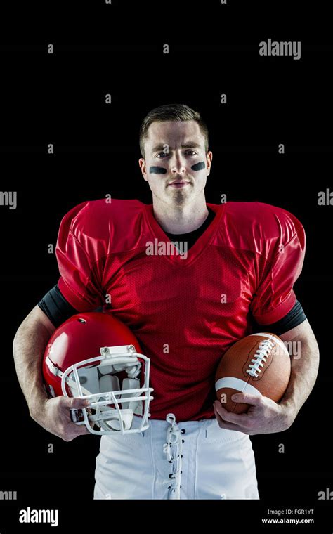 American Football Player Holding Helmet Stock Photo Alamy