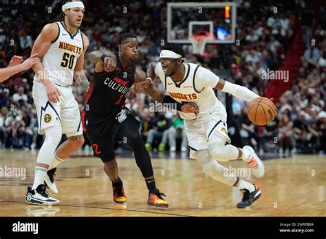 Denver Nuggets Guard Reggie Jackson Pushes Past Miami Heat Guard Terry