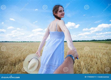 Come with Me, Young Beautiful Girl Holds the Hand of a Man in a Wheat ...