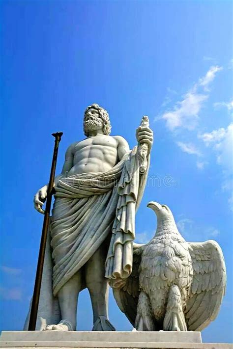 The First Statue Shows Zeus Or Jupiter Holding A Lightning Bolt In