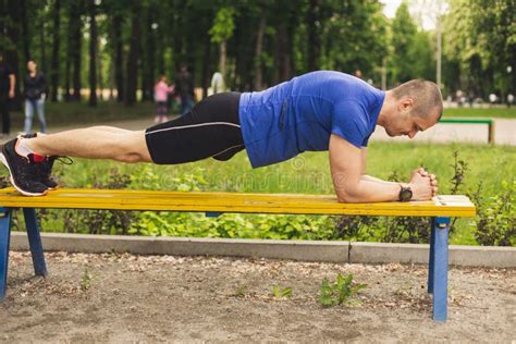 man  plank exercise   bench stock image image  sport exercise