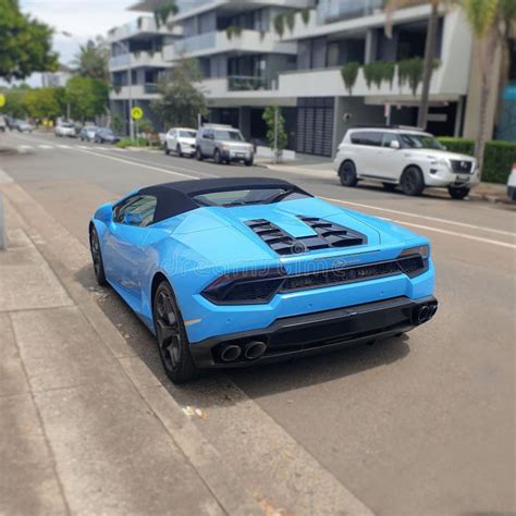 Blue Lamborghini Huracan Convertible Parked On Street Stock Image