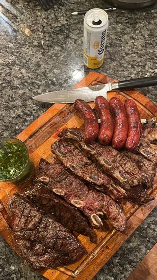 Argentine Asado Homemade Chimichurri Chorizo Tiras De Asado Bife