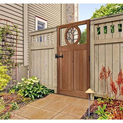 35 Ft X 6 Ft Cedar Fence Gate With Round Metal Art Insert 201568 The Home Depot Wooden