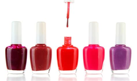 premium photo set  nail polishes isolated  white