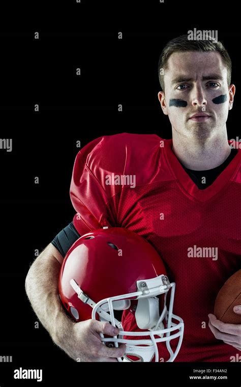 American Football Player Holding Helmet Stock Photo Alamy