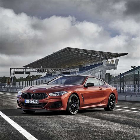 The New Bmw M I Xdrive Coupe In Colour Sunset Orange And M Light