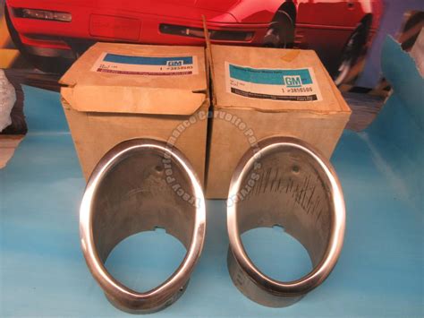 1964 1965 Corvette Exhaust Tip Bezels Pair NOS R L 3850505 3850506