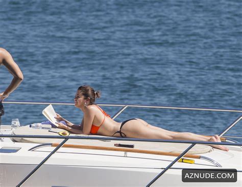 Selena Gomez Sexy In Black Orange Bikini On A Boat With Friends Around