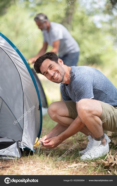 Two Men Setting Tent Camping Nature Stock Photo by ©photography33 652955894