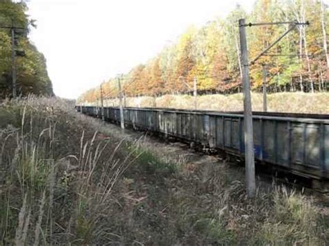 ET22 1124 PKP Cargo Tarnowskie Góry z składem węglarek przed stacją