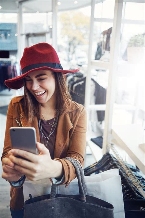 Snapping Selfies In Nature Portrait Of A Happy Young Woman Taking A