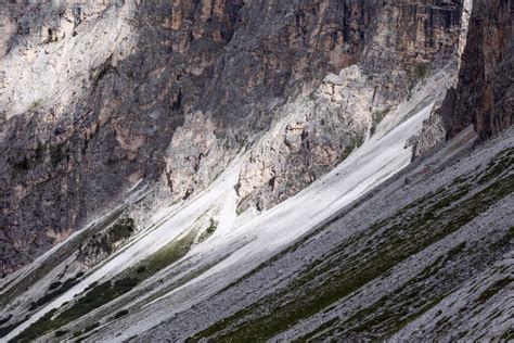 Minimalistic Landscape Of The Dolomites Slope With Typical Stone