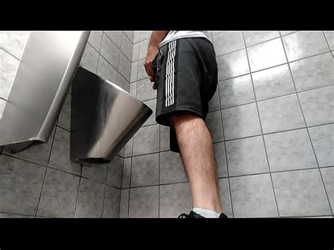 A Busy Guy With An Uncut Dick Peeing In A Public Toilet XVIDEOS