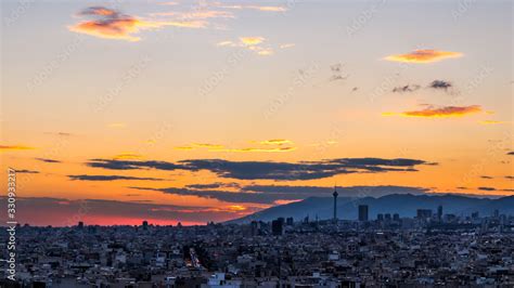 Tehran skyline at the sunset with Milad tower in the frame, colorful ...