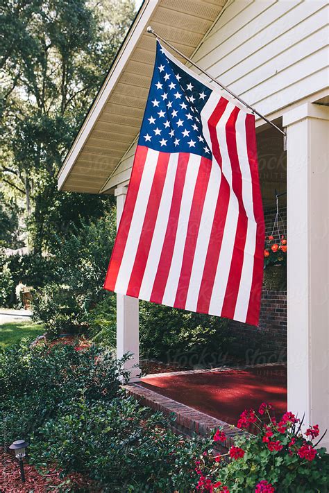 Us Flag On Front Porch By Stocksy Contributor Stephen Morris Stocksy