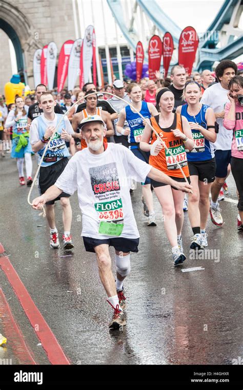 Runners Participating Running In Iconic London Marathon England Mature Senior Old Mature Elder