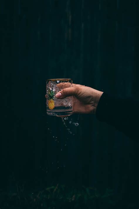 Person holding clear drinking glass with water photo – Free Glass Image on Unsplash