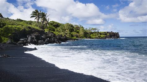 Explore the Black Sands of Honokalani Beach