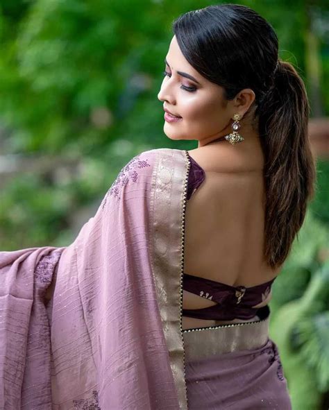 Anasuya Bharadwaj Hot Photoshoot In Sleeveless Bare Back Saree Glamsundari In