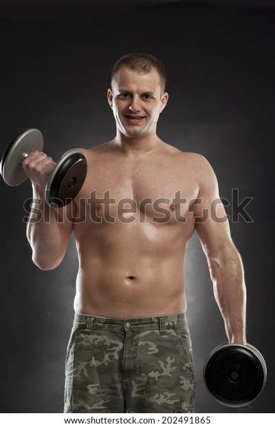Man Lifting Dumbbells Hal Naked On Stock Photo Shutterstock