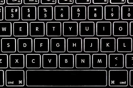 royalty  photo close  shot   backlit keyboard   laptop