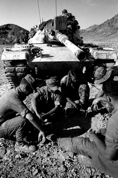 A Marine M60 tank crew discusses their strategy in an upcoming tank ...