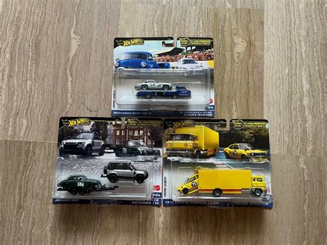 HOT WHEELS TEAM TRANSPORT MERCEDES BENZ LAND ROVER DEFENDER AND SAKURA SPRINTER Hobbies Toys