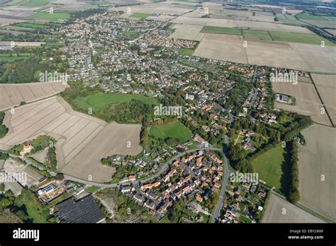 An Aerial View Of The Cambridgeshire Village Of Burwell And Surrounding