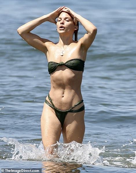Annalynne Mccord Shows Off Her Impressive Body With In A Micro Bikini As She Hits The Beach