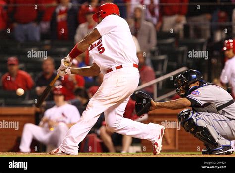 St Louis Cardinals First Baseman Albert Pujols Makes Contact With