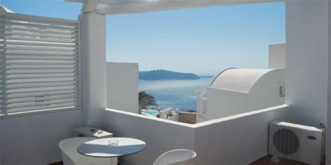 ROCABELLA SANTORINI ROOMS & SUITES Rocabella Santorini was born out of ...