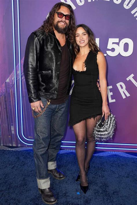 Jason Momoa, Adria Arjona Gush About Their Red Carpet Debut as a Couple