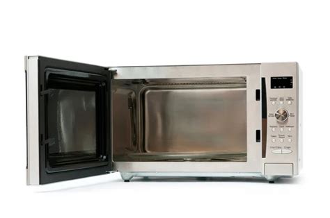 Microwave Oven On The Table — Stock Photo © Elnur 53008575