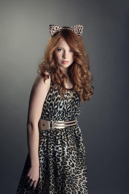 Premium Photo Shot Of Babe In Leopard Print Dress And Cat Ears
