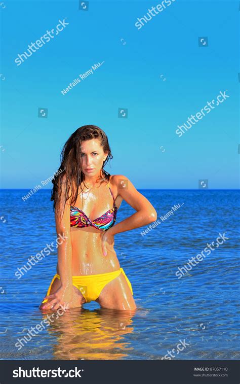 Стоковая фотография Sexy Bikini Model Posing On Beach Shutterstock