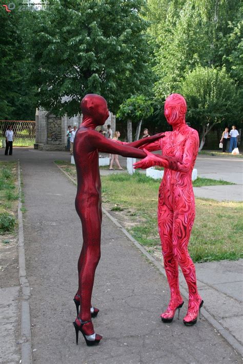 Two Horny Red Zentai Wearing Chick Exposing Xxx Dessert Picture