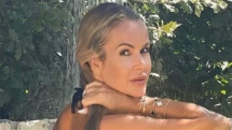 Amanda Holden 52 Showcases Her Age Defying Physique In A TINY Black Bikini As She Sizzles In