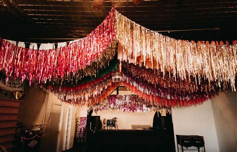 Disco Balls And A Ceiling Of Sparkling Streamers For This Diy Leap Day Wedding Ceiling