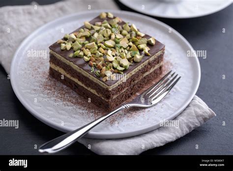 Chocolate cake with Pistachio nuts closeup Stock Photo - Alamy