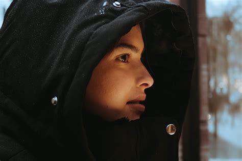 Close Up Shot of a Woman in Black Hoodie · Free Stock Photo