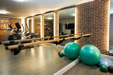 In home basement gym with ballet bar and backlit mirrors #basementgym ...