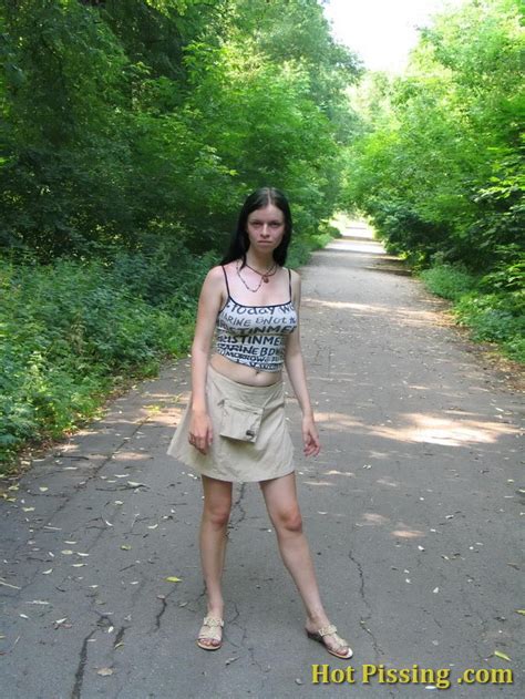 Amazing Brunette Squats In The Middle Of The Road And Starts Leaking Porn Pictures Xxx Photos