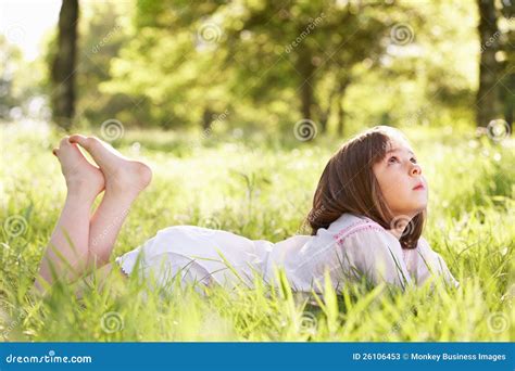 Young Girl Daydreaming Lying In Summer Field Stock Image Image Of