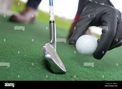 Person Holding Golf Ball Hi Res Stock Photography And Images Alamy