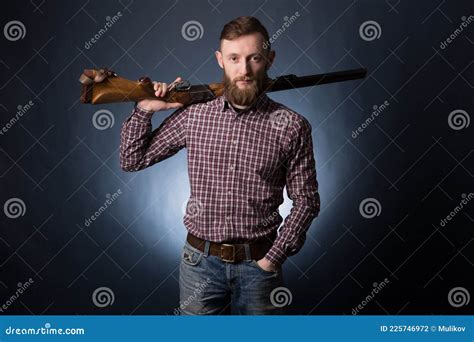 Man With Shotgun On A Dark Background Stock Photo Image Of Weapon